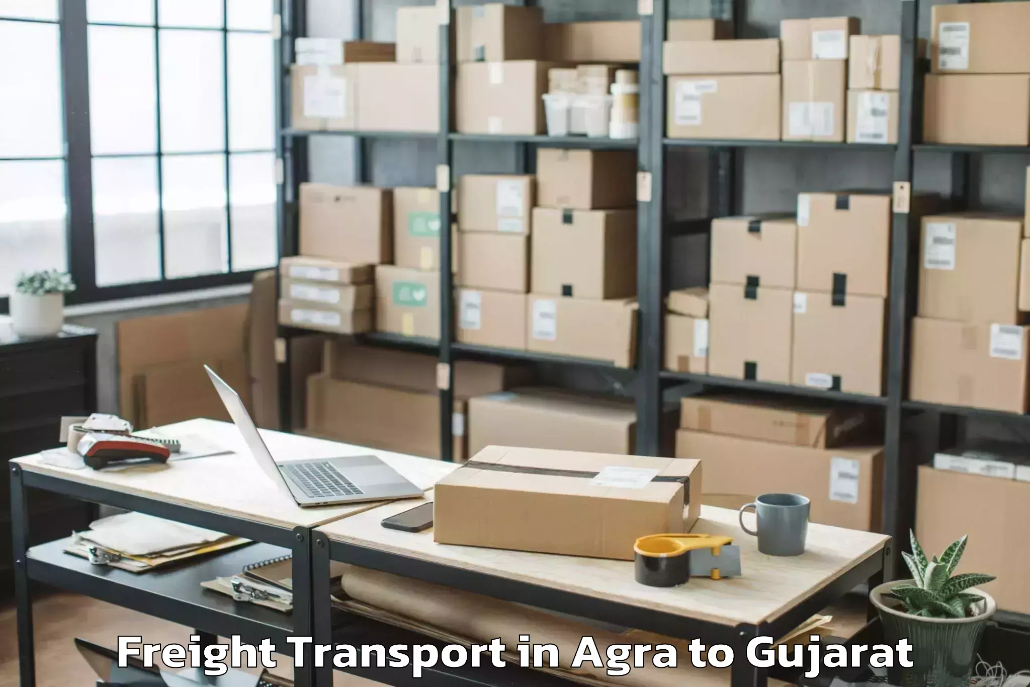 Affordable Agra to Vansda Freight Transport